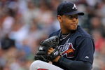 DENVER - JULY 11:  Starting pitcher Jair Jurrjens #49 of the Atlanta Braves delivers against the Colorado Rockies backs during MLB action at Coors Field on July 11, 2009 in Denver, Colorado. The Braves defeated the Rockies 4-3.  (Photo by Doug Pensinger/Getty Images)