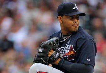 DENVER - JULY 11:  Starting pitcher Jair Jurrjens #49 of the Atlanta Braves delivers against the Colorado Rockies backs during MLB action at Coors Field on July 11, 2009 in Denver, Colorado. The Braves defeated the Rockies 4-3.  (Photo by Doug Pensinger/Getty Images)