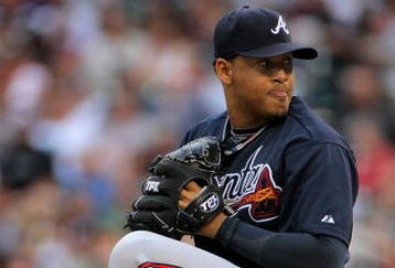 DENVER - JULY 11:  Starting pitcher Jair Jurrjens #49 of the Atlanta Braves delivers against the Colorado Rockies backs during MLB action at Coors Field on July 11, 2009 in Denver, Colorado. The Braves defeated the Rockies 4-3.  (Photo by Doug Pensinger/Getty Images)