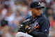 DENVER - JULY 11:  Starting pitcher Jair Jurrjens #49 of the Atlanta Braves delivers against the Colorado Rockies backs during MLB action at Coors Field on July 11, 2009 in Denver, Colorado. The Braves defeated the Rockies 4-3.  (Photo by Doug Pensinger/Getty Images)