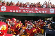 PASADENA, CA - JANUARY 01:  The USC Trojans run out onto the field before the 95th Rose Bowl Game presented by Citi against the Penn State Nittany Lions at the Rose Bowl on January 1, 2009 in Pasadena, California. The Trojans defeated the Nittany Lions 38-24.  (Photo by Christian Petersen/Getty Images)