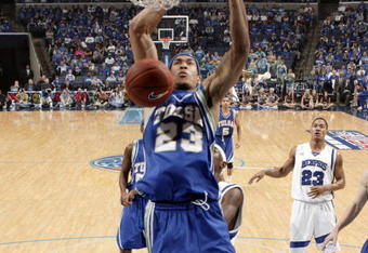 MEMPHIS, TN - MARCH 15: Jerome Jordan #23 of the Tulsa Golden Hurricane dunks the ball past Robert Dozier #2 of the Memphis Tigers during the finals of the Conference USA Basketball Tournament at FedexForum on March 15, 2008 in Memphis, Tennessee. (Photo by Joe Murphy/Getty Images)