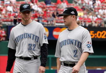 ST. LOUIS, MO - JULY 14:  American League All-Stars Roy Halladay and Aaron Hill of the Toronto Blue Jays look on before the 2009 MLB All-Star Game at Busch Stadium on July 14, 2009 in St Louis, Missouri. (Photo by Jamie Squire/Getty Images)