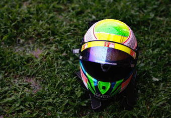KUALA LUMPUR, MALAYSIA - APRIL 05:  The drivers helmet of Felipe Massa of Brazil and Ferrari is seen in the rain during the Malaysian Formula One Grand Prix at the Sepang Circuit on April 5, 2009 in Kuala Lumpur, Malaysia.  (Photo by Paul Gilham/Getty Images)