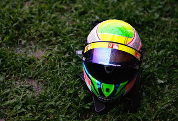 KUALA LUMPUR, MALAYSIA - APRIL 05:  The drivers helmet of Felipe Massa of Brazil and Ferrari is seen in the rain during the Malaysian Formula One Grand Prix at the Sepang Circuit on April 5, 2009 in Kuala Lumpur, Malaysia.  (Photo by Paul Gilham/Getty Images)