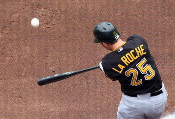 NEW YORK - MAY 09:  Adam LaRoche #25 of the Pittsburgh Pirates bats against the New York Mets on May 9, 2009 at Citi Field in the Flushing neighborhood of the Queens borough of New York City. The Mets defeated the Pirates 10-1.  (Photo by Jim McIsaac/Getty Images)
