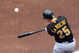 NEW YORK - MAY 09:  Adam LaRoche #25 of the Pittsburgh Pirates bats against the New York Mets on May 9, 2009 at Citi Field in the Flushing neighborhood of the Queens borough of New York City. The Mets defeated the Pirates 10-1.  (Photo by Jim McIsaac/Getty Images)