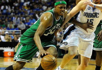 ORLANDO, FL - MAY 14:  Paul Pierce #34 of the Boston Celtics drives past Hedo Turkoglu #15 of the Orlando Magic in Game Six of the Eastern Conference Semifinals during the 2009 NBA Playoffs at Amway Arena on May 14, 2009 in Orlando, Florida.  NOTE TO USER: User expressly acknowledges and agrees that, by downloading and/or using this Photograph, user is consenting to the terms and conditions of the Getty Images License Agreement.  (Photo by Sam Greenwood/Getty Images)