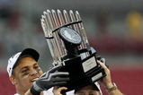 TAMPA, FL - DECEMBER 06:  Defensive end Orion Martin #90 and head coach Frank Beamer of the Virginia Tech Hokies holds up the ACC trophy after defeating the Boston College Eagles in the 2008 ACC Football Championship game at the Raymond James Stadium on December 6, 2008 in Tampa, Florida. Virginia Tech defeated Boston College 30-12.  (Photo by Doug Benc/Getty Images)