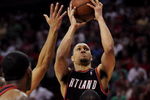 HOUSTON - APRIL 26:  Guard Brandon Roy #7 of the Portland Trail Blazers goes up for a shot where he is called for an offensive foul against Chuck Hayes #44 of the Houston Rockets in the last minute of play in Game Four of the Western Conference Quarterfinals during the 2009 NBA Playoffs at Toyota Center on April 26, 2009 in Houston, Texas. NOTE TO USER: User expressly acknowledges and agrees that, by downloading and or using this photograph, User is consenting to the terms and conditions of the Getty Images License Agreement.  (Photo by Ronald Martinez/Getty Images)