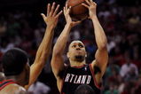 HOUSTON - APRIL 26:  Guard Brandon Roy #7 of the Portland Trail Blazers goes up for a shot where he is called for an offensive foul against Chuck Hayes #44 of the Houston Rockets in the last minute of play in Game Four of the Western Conference Quarterfinals during the 2009 NBA Playoffs at Toyota Center on April 26, 2009 in Houston, Texas. NOTE TO USER: User expressly acknowledges and agrees that, by downloading and or using this photograph, User is consenting to the terms and conditions of the Getty Images License Agreement.  (Photo by Ronald Martinez/Getty Images)
