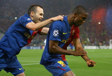 ROME - MAY 27:  Samuel Eto'o of Barcelona and his team mate Andres Iniesta celebrate after Eto'o scored the first goal for Barcelona during the UEFA Champions League Final match between Manchester United and Barcelona at the Stadio Olimpico on May 27, 2009 in Rome, Italy.  (Photo by Alex Livesey/Getty Images)