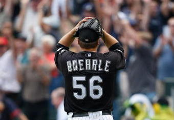 CHICAGO, IL - JULY 23: Pitcher Mark Buehrle #56 of the Chicago White Sox reacts in celebration after pitching a perfect game against the Tampa Bay Rays at U.S. Cellular Field on July 23, 2009 in Chicago, Illinois. The White Sox defeated the Rays 5-0, as Buehrle became the 18th pitcher in 132 years of major league baseball to throw a perfect game. (Photo by Scott Boehm/Getty Images)