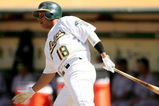 OAKLAND, CA - JUNE 28: Orlando Cabrera #18 of the Oakland Athletics bats against the Colorado Rockies at the Oakland Coliseum on June 28, 2009 in Oakland, California.  (Photo by Ezra Shaw/Getty Images)