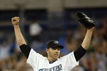 TORONTO - AUGUST 14:  Roy Halladay #32 of the Toronto Blue Jays celebrates his complete game win against the Los Angeles Angels of Anaheim on August 14, 2007 at the Rogers Centre in Toronto, Ontario, Canada.  (Photo by Dave Sandford/Getty Images)