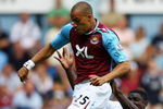 LONDON - AUGUST 11:  Micah Richards of Manchester City tackles Bobby Zamora of West Ham during the Barclays Premiership match between West Ham United and Manchester City at Upton Park on August 11, 2007 in London, England.  (Photo by Ryan Pierse/Getty Images)