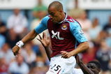 LONDON - AUGUST 11:  Micah Richards of Manchester City tackles Bobby Zamora of West Ham during the Barclays Premiership match between West Ham United and Manchester City at Upton Park on August 11, 2007 in London, England.  (Photo by Ryan Pierse/Getty Images)