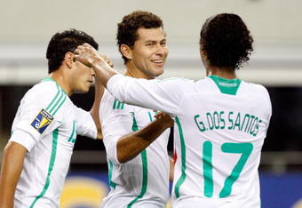 ARLINGTON, TX - JULY 19:  Forward Miguel Sabah #14 celebrates his second goal with Giovani Dos Santos #17 of Mexico against Haiti during the CONCACAF Gold Cup Quarterfinals at Dallas Cowboys Stadium on July 19, 2009 in Arlington, Texas.  (Photo by Ronald Martinez/Getty Images)