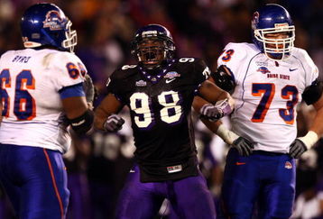SAN DIEGO, CA - DECEMBER 23:  Defensive End Jerry Hughes #98 of the TCU Horned Frogs celebrates his sack Quarterback Kellen Moore #11 of Boise State Broncos during Frogs' 17-16 win over the Broncos in the San Diego County Credit Union Poinsettia Bowl at Qualcomm Stadium on December 23, 2008 in San Diego, California. (Photo by Donald Miralle/Getty Images)