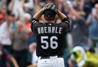 CHICAGO, IL - JULY 23: Pitcher Mark Buehrle #56 of the Chicago White Sox reacts in celebration after pitching a perfect game against the Tampa Bay Rays at U.S. Cellular Field on July 23, 2009 in Chicago, Illinois. The White Sox defeated the Rays 5-0, as Buehrle became the 18th pitcher in 132 years of major league baseball to throw a perfect game. (Photo by Scott Boehm/Getty Images)