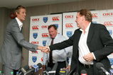 PORTSMOUTH, UNITED KINGDOM - JULY 11:  Peter Crouch (L) and manager Harry Redknapp (R)  shake hands as they attend the press conference to announce the signing of Peter Crouch to Portsmouth FC at Fratton Park on July 11, 2008 in Portsmouth, England.  (Photo by Christopher Lee/Getty Images)