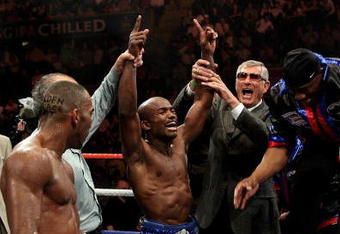 NOTTINGHAM, ENGLAND - MAY 10:  Timothy Bradley celebrates his win against Junior Witter for the WBC Light Welterweight fight on May 10, 2008 at Nottingham Ice Arena in Nottingham, England. (Photo by John Gichigi/Getty Images)