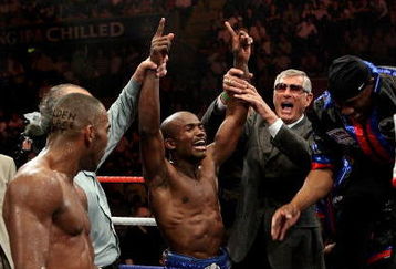 NOTTINGHAM, ENGLAND - MAY 10:  Timothy Bradley celebrates his win against Junior Witter for the WBC Light Welterweight fight on May 10, 2008 at Nottingham Ice Arena in Nottingham, England. (Photo by John Gichigi/Getty Images)