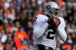 DENVER - NOVEMBER 23:  Quarterback JaMarcus Russell #2 of the Oakland Raiders delivers a pass against the Denver Broncos during week 12 NFL action at Invesco Field at Mile High on November 23, 2008 in Denver, Colorado. The Raiders defeated the Broncos 31-10.  (Photo by Doug Pensinger/Getty Images)