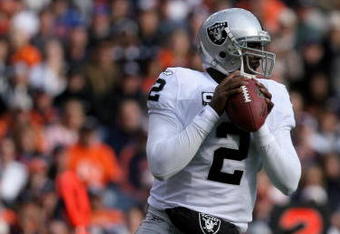 DENVER - NOVEMBER 23:  Quarterback JaMarcus Russell #2 of the Oakland Raiders delivers a pass against the Denver Broncos during week 12 NFL action at Invesco Field at Mile High on November 23, 2008 in Denver, Colorado. The Raiders defeated the Broncos 31-10.  (Photo by Doug Pensinger/Getty Images)