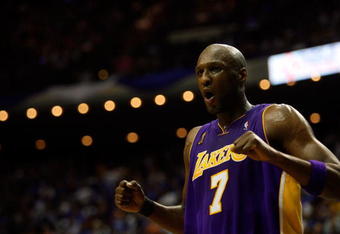 ORLANDO, FL - JUNE 09:  Lamar Odom #7 of the Los Angeles Lakers reacts in the fourth quarter against the Orlando Magic in Game Three of the 2009 NBA Finals on June 9, 2009 at Amway Arena in Orlando, Florida.  NOTE TO USER:  User expressly acknowledges and agrees that, by downloading and or using this photograph, User is consenting to the terms and conditions of the Getty Images License Agreement.  (Photo by Chris Graythen/Getty Images)