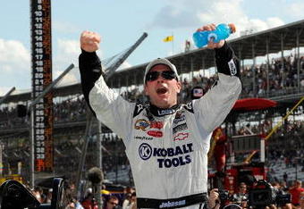 INDIANAPOLIS - JULY 26:  Jimmie Johnson, driver of the #48 Lowe's/KOBALT Tools Chevrolet, celebrates after winning the NASCAR Sprint Cup Series Allstate 400 at the Brickyard at Indianapolis Motor Speedway on July 26, 2009 in Indianapolis, Indiana.  (Photo by John Harrelson/Getty Images for NASCAR)