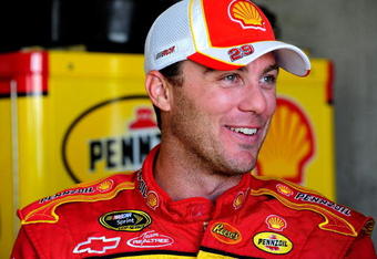 INDIANAPOLIS - JULY 25:  Kevin Harvick, driver of the #29 Shell/Pennzoil Chevrolet, smiles in the garage before practice for the NASCAR Sprint Cup Series Allstate 400 at the Brickyard at Indianapolis Motor Speedway on July 25, 2009 in Indianapolis, Indiana.  (Photo by Rusty Jarrett/Getty Images for NASCAR)