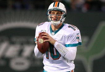 EAST RUTHERFORD, NJ - DECEMBER 28:  Chad Pennington #10 of The Miami Dolphins looks to pass against the New York Jets during their game on December 28, 2008 at Giants Stadium in East Rutherford, New Jersey.  (Photo by Al Bello/Getty Images)