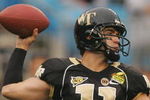 CHARLOTTE, NC - DECEMBER 29:  Riley Skinner #11 of the Wake Forest Demon Deacons throws a pass against the Connecticut Huskies during their game at Bank of America Stadium on December 29, 2007 in Charlotte, North Carolina. (Photo by Streeter Lecka/Getty Images)
