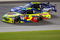 JOLIET, IL - JULY 11: Mark Martin, driver of the #5 CARQUEST/Kellogg's Chevrolet, races Jimmie Johnson, driver of the #48 Lowe's Chevrolet, during the NASCAR Sprint Cup Series LifeLock.com 400 at Chicagoland Speedway on July 11, 2009 in Joliet, Illinois.  (Photo by Geoff Burke/Getty Images for NASCAR)