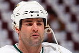 VANCOUVER, BC - APRIL 23:  Eric Lindros #88 of the Dallas Stars looks on against the Vancouver Canucks during Game 7 of the 2007 Western Conference Quarterfinals at General Motors Place on April 23, 2007 in Vancouver, British Columbia, Canada. The Canucks won 4-1 to win the series 4-3. (Photo by Jeff Vinnick/Getty Images)