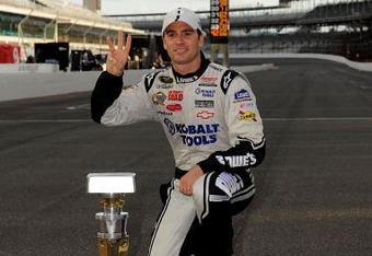 INDIANAPOLIS - JULY 26:  Jimmie Johnson, driver of the #48 Lowe's/KOBALT Tools Chevrolet, celebrates after winning the NASCAR Sprint Cup Series Allstate 400 at the Brickyard at Indianapolis Motor Speedway on July 26, 2009 in Indianapolis, Indiana.  (Photo by John Harrelson/Getty Images for NASCAR)