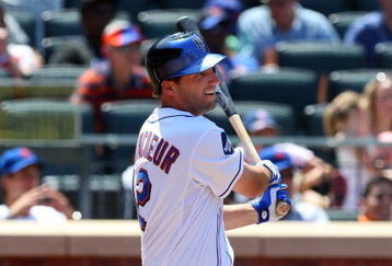 NEW YORK - JULY 12:  Jeff Francoeur #12 of the New York Mets bats against the Cincinnati Reds on July 12, 2009 at Citi Field in the Flushing neighborhood of the Queens borough of New York City.  (Photo by Jim McIsaac/Getty Images)