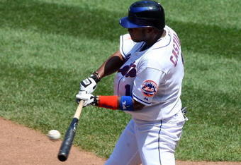 NEW YORK - JULY 12:  Luis Castillo #1 of the New York Mets connects for a third inning base hit against the Cincinnati Reds on July 12, 2009 at Citi Field in the Flushing neighborhood of the Queens borough of New York City.  (Photo by Jim McIsaac/Getty Images)