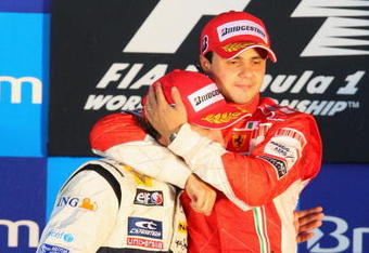 SAO PAULO, BRAZIL - NOVEMBER 02:  Felipe Massa of Brazil and Ferrari looks disappointed on the podium alongside second placced Fernando Alonso of Spain and Renault after winning the race but losing the World Championship at the Brazilian Formula One Grand Prix at the Interlagos Circuit on November 2, 2008 in Sao Paulo, Brazil.  (Photo by Mark Thompson/Getty Images)