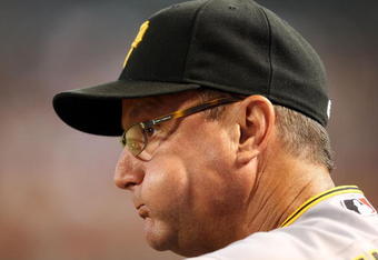 PHOENIX - JULY 25:  Manager John Russell of the Pittsburgh Pirates watches from the dugout during the major league baseball game against the Arizona Diamondbacks at Chase Field on July 25, 2009 in Phoenix, Arizona.  (Photo by Christian Petersen/Getty Images)