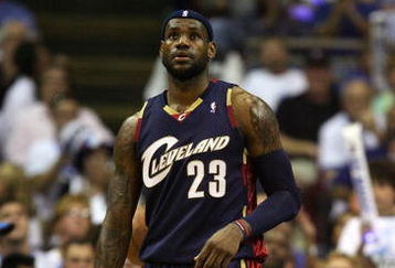 ORLANDO, FL - MAY 30:  LeBron James #23 of the Cleveland Cavaliers looks on between plays against the Orlando Magic in Game Six of the Eastern Conference Finals during the 2009 Playoffs at Amway Arena on May 30, 2009 in Orlando, Florida. NOTE TO USER: User expressly acknowledges and agrees that, by downloading and or using this photograph, User is consenting to the terms and conditions of the Getty Images License Agreement  (Photo by Elsa/Getty Images)