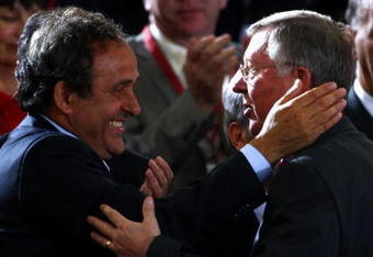 ROME - MAY 27:  Sir Alex Ferguson manager of Manchester United is greeted by Uefa president Michel Platini after Manchester United lost the UEFA Champions League Final match between Barcelona and Manchester United at the Stadio Olimpico on May 27, 2009 in Rome, Italy. Barcelona won 2-0.  (Photo by Laurence Griffiths/Getty Images)