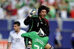 EAST RUTHERFORD, NJ - JULY 26:  Goalkeeper Guillermo Ochoa #1 and Juan Carlos Valenzuela #21 of Mexico celebrate 5-0 win over the United States in the CONCACAF Gold Cup Championship match at Giants Stadium on July 26, 2009 in East Rutherford, New Jersey.  (Photo by Jeff Zelevansky/Getty Images)