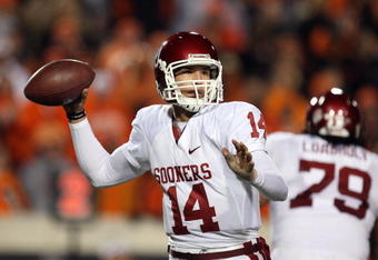 STILLWATER, OK - NOVEMBER 29:  Quarterback Sam Bradford #14 of the Oklahoma Sooners drops back to pass against the Oklahoma State Cowboys at Boone Pickens Stadium on November 29, 2008 in Stillwater, Oklahoma.  (Photo by Ronald Martinez/Getty Images)