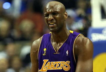 ORLANDO, FL - JUNE 11:  Lamar Odom #7 of the Los Angeles Lakers reacts in the second quarter against the Orlando Magic in Game Four of the 2009 NBA Finals on June 11, 2009 at Amway Arena in Orlando, Florida.  NOTE TO USER:  User expressly acknowledges and agrees that, by downloading and or using this photograph, User is consenting to the terms and conditions of the Getty Images License Agreement.  (Photo by Elsa/Getty Images)