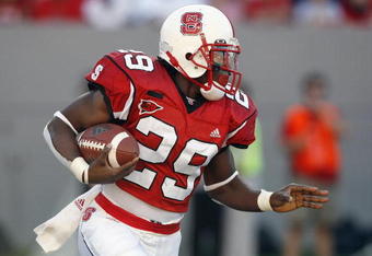 RALEIGH, NC - SEPTEMBER 29 : Jamelle Eugene #29 of the North Carolina State Wolfpack carries the ball during the game against the Louisville Cardinals at Carter-Finley Stadium September 29, 2007 in Raleigh, North Carolina.  Louisville defeated North Carolina State 29-10.  (Photo by Kevin C. Cox/Getty Images)
