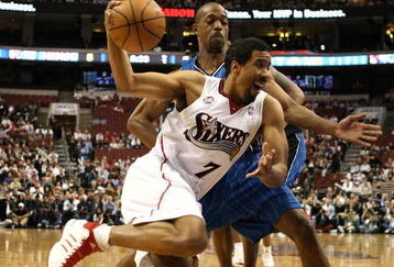 PHILADELPHIA - APRIL 30: Andre Miller #7  of the Philadelphia 76ers drives to the basket against Rafer Alston #1 of the Orlando Magic during Game Six of the Eastern Conference Quarterfinals at Wachovia Center on April 30, 2009 in Philadelphia, Pennsylvania. NOTE TO USER: User expressly acknowledges and agrees that, by downloading and or using this photograph, User is consenting to the terms and conditions of the Getty Images License Agreement.  (Photo by Nick Laham/Getty Images)