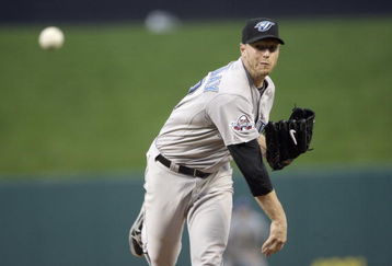 ST. LOUIS, MO - JULY 14: American League All-Star Roy Halladay of the Toronto Blue Jays pitches during the 2009 MLB All-Star Game at Busch Stadium on July 14, 2009 in St Louis, Missouri. (Photo by Pool/Getty Images)
