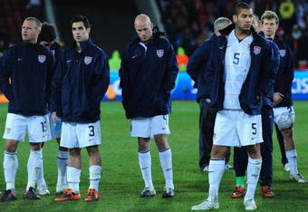 JOHANNESBURG, SOUTH AFRICA - JUNE 28:  Oguchi Onyewu (R) of USA and his team mates show their dejection at the end of the FIFA Confederations Cup Final between USA and Brazil at the Ellis Park Stadium on June 28, 2009 in Johannesburg, South Africa.  (Photo by Laurence Griffiths/Getty Images)